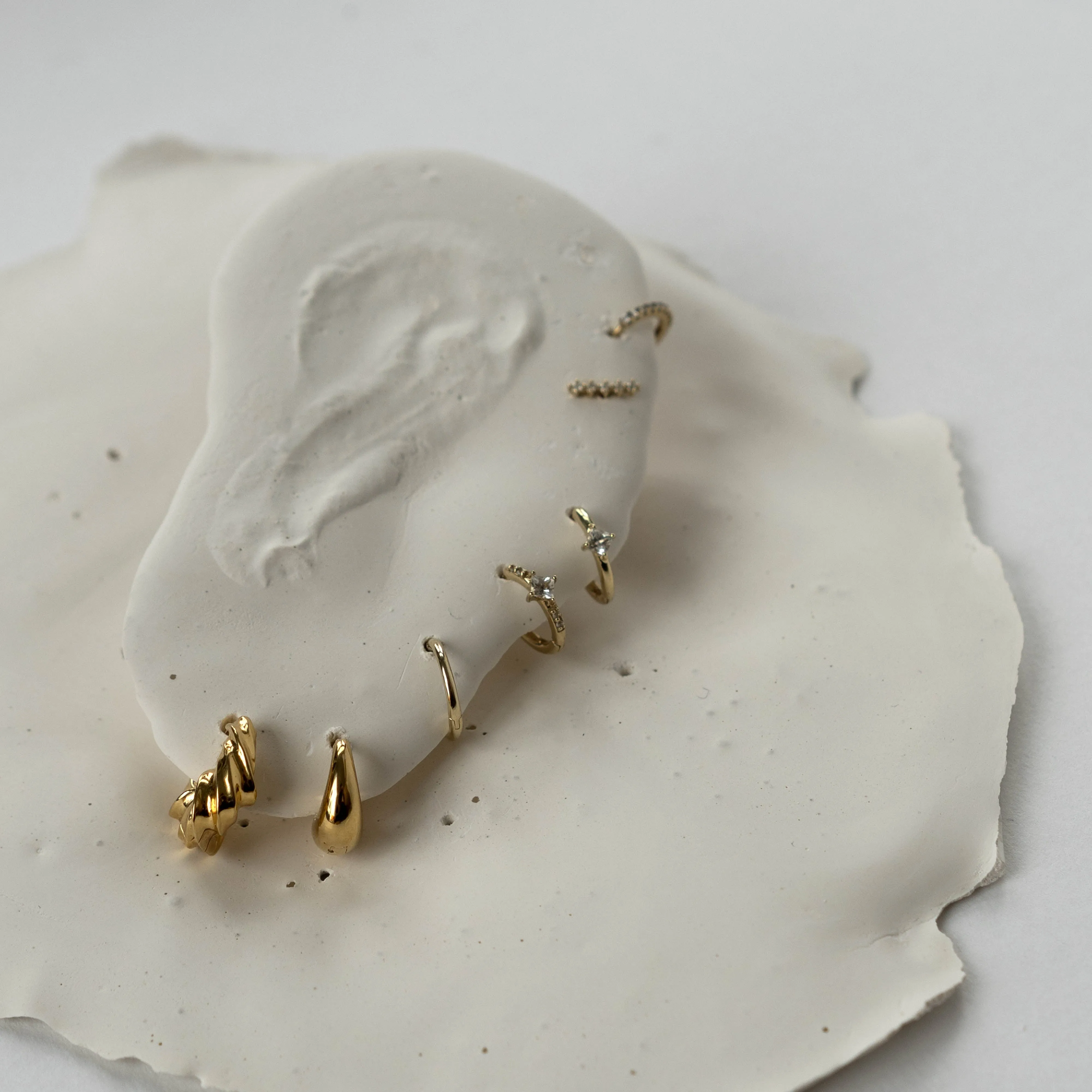 White Sapphire Huggie Hoops